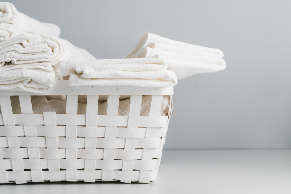 front-view-white-basket-with-towels